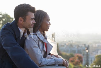 Affectionate couple looking at view, Paris, France
