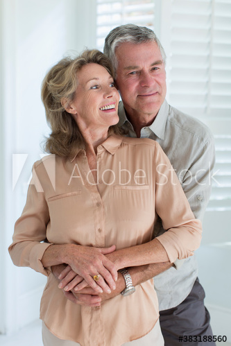 Affectionate senior couple hugging
