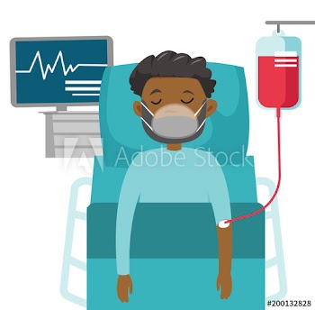 African-american man in coma lying in bed with a heart rate monitor in the hospital