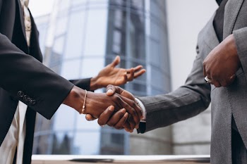 African business male people shaking hands Free Photo