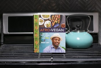 Afro-vegan Cookbook on Black Gas Range Oven