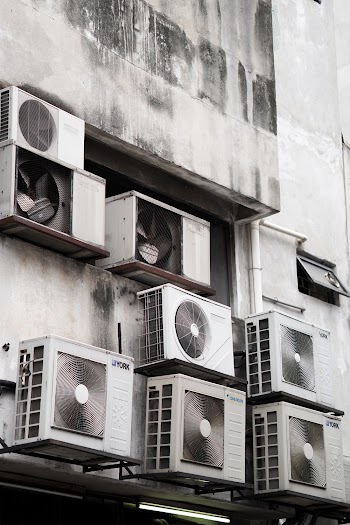 Air-conditioners Mounted On A`Building Wall
