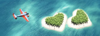 Airplane above the two heart-shaped tropical island in middle of the...