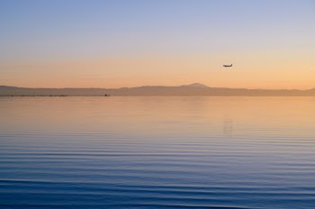 Airplane Flying over Sea