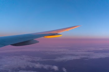 airplane wing in the sky