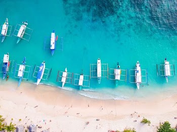aligned boat seashore