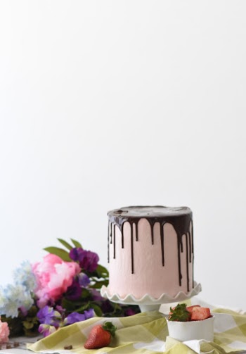 Along with spring comes birds chirping as the sun rises to greet the day, cool breezes and bright colors to inspire. Chocolate strawberry cake encompasses the few beautiful things about spring that words don't do justice. Utterly beautiful is this time of year.