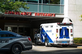 Ambulance At Hospital Entrance