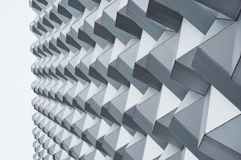 An abstract pattern in a gray building facade in Dresden