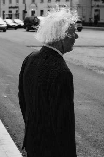 An Elderly Man Standing on a Street  · Free Stock Photo