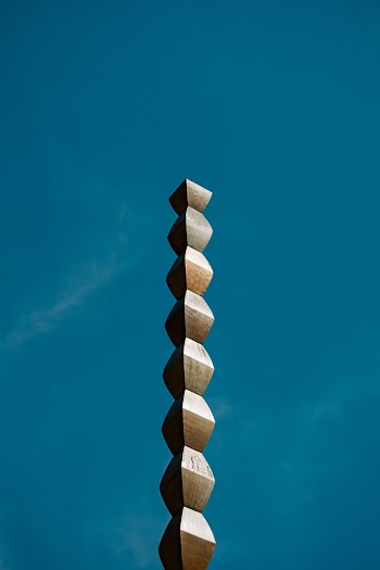 An Elongated Wooden Carving