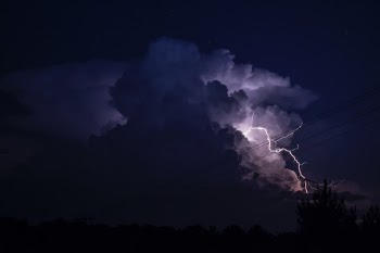 An isolated single cell thunderstorm with an amazing light show. 