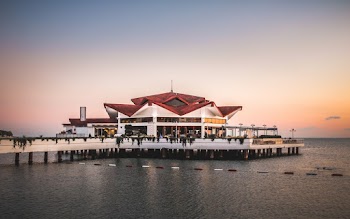 An Octagonal  Shaped Building Built Above Water