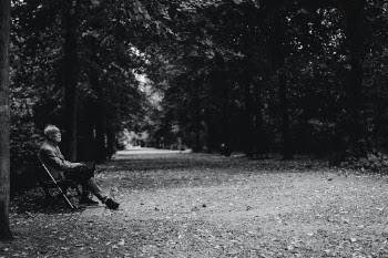 An old man sitting in a Park - Berlin