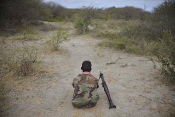 An SNA soldier rests on the frontline | Free Photo - rawpixel