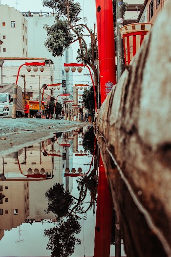 An Under Construction Road With Water