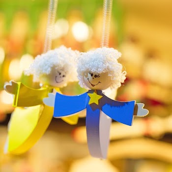 Angel Woman in Blue Dress Pendant Near Angel Woman in Yellow Dress Pendant