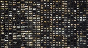 Apartment Building Windows Glowing