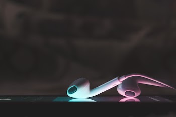 Apple Earpods On Top Of Iphone 