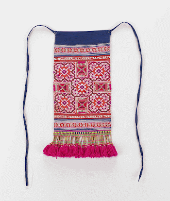 apron with fuchsia tassels attach | Free Photo - rawpixel