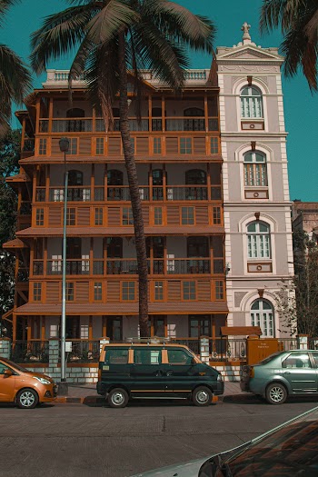 Architectural Photo of a Pink and Brown Building