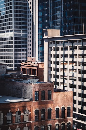Architectural Photo of Brown and White Buildings