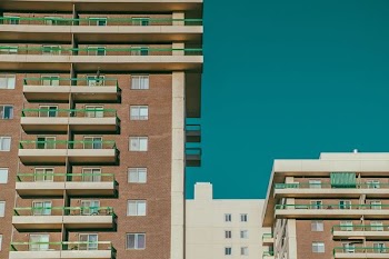 architectural photography of brown and beige concrete building