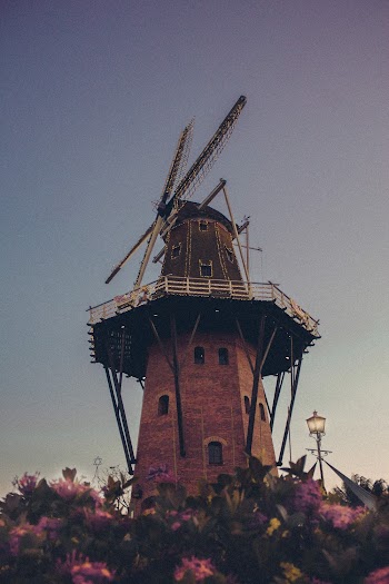 Architectural Photography of Brown Windmill