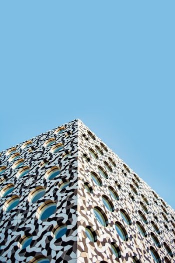 architectural photography of triangular building