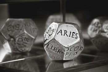 Aries Dice in Gray Scale Photography