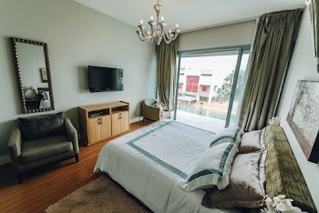 Arranged White Bedspread Inside Room