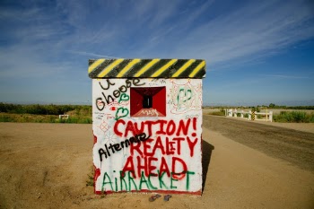 As you leave Slab City (a 'free community' east of the Salton Sea) you see this painted, now defunct, guard shack. Colorful and funny.