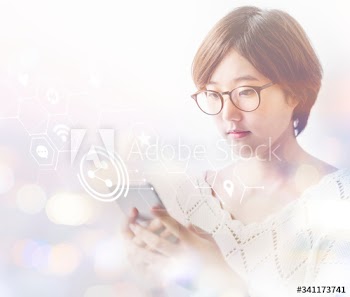 Asian girl using a phone