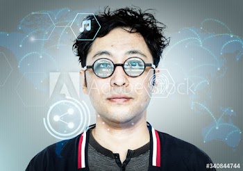 Asian hacker with computer code on his glasses