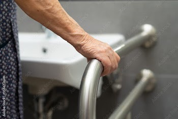 Asian senior or elderly old lady woman patient use toilet bathroom handle security in nursing hospital ward : healthy strong medical concept.