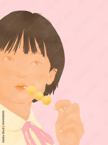 Asian teenage girl eating Hong Kong curry fish balls