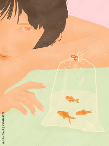 Asian teenage girl looking at goldfish 