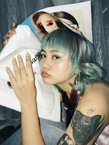 Asian Woman With Tattoos