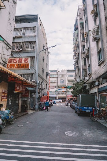Asphalt Road Between Buildings