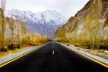 Asphalt Road Between Rock Mountains