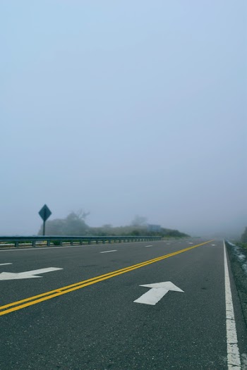Asphalt Road Covered With Fog