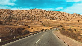 Asphalt Road Near Mountain 