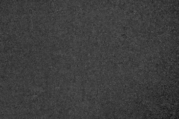Asphalt road texture in dark gray color Free Photo