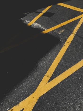 Asphalt Road With Yellow Lane