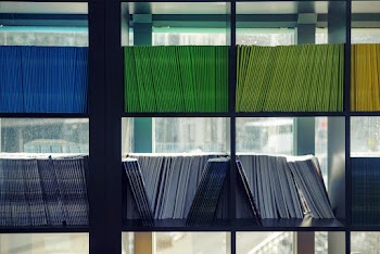 Assorted Books On Bookcase