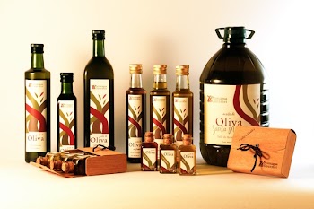 Assorted Bottles on White Table