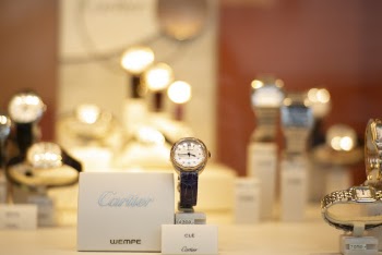 Assorted Cartier Analog Watches on Display