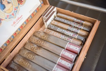 Assorted Cigar Packs In Brown Case 