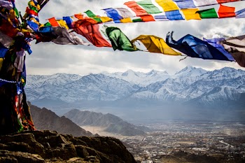 Assorted-color Banners on Mountain
