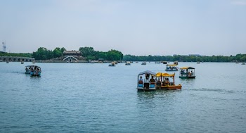 Assorted-color Boats Under White Sky